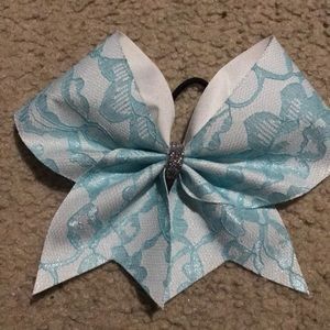 Light blue and white lace cheer bow